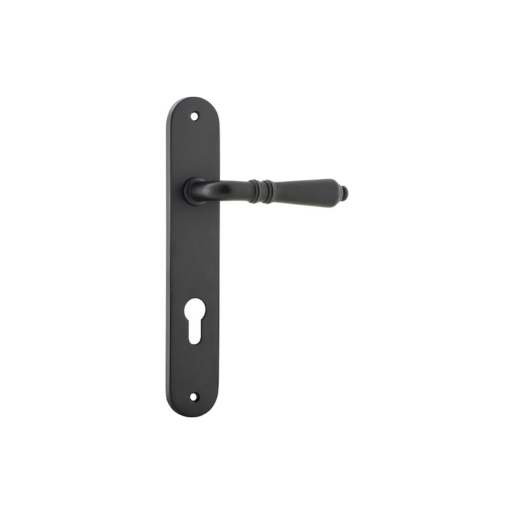 Pair of Iver Sarlat lever handle door handles on oval backplates, featuring a sleek, modern design with a polished finish.