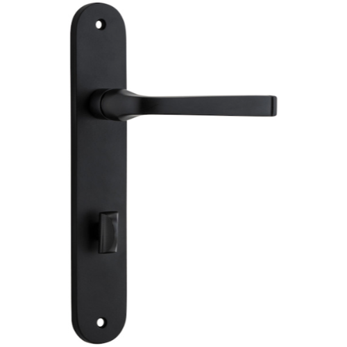Pair of Iver Annecy lever door handles with oval backplates, sleek brass finish, and modern design for interior doors.
