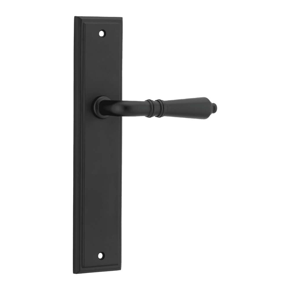 Pair of Iver Sarlat lever handles on stepped backplates, showcasing polished brass finish and classic door hardware design.