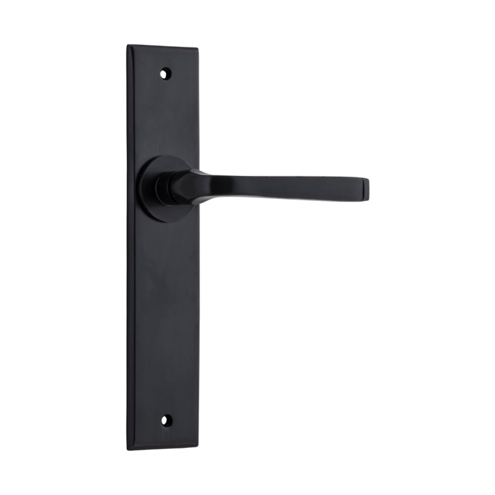 Pair of Iver Annecy lever door handles with chamfered backplates, showcasing elegant, modern design in brushed metal finish.