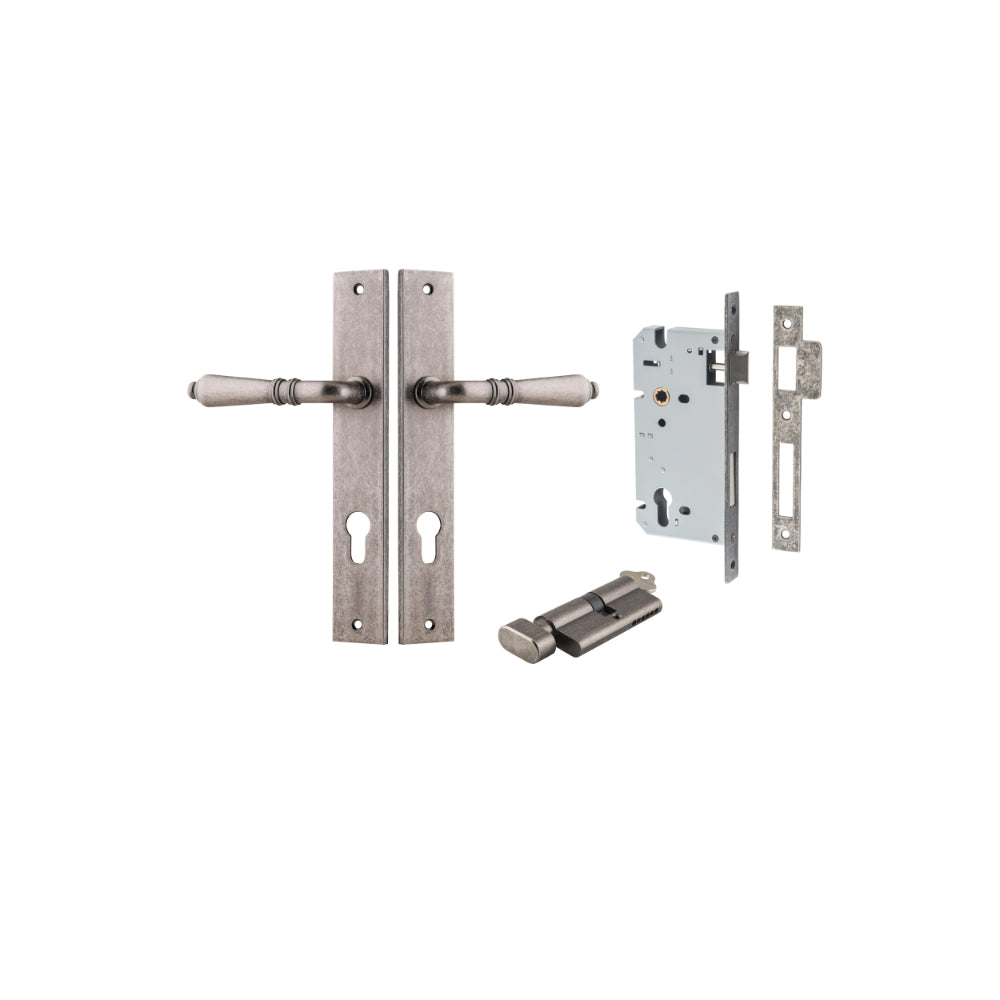 Pair of Iver Sarlat lever handles with rectangular backplates, featuring a sleek, modern design in a polished finish.