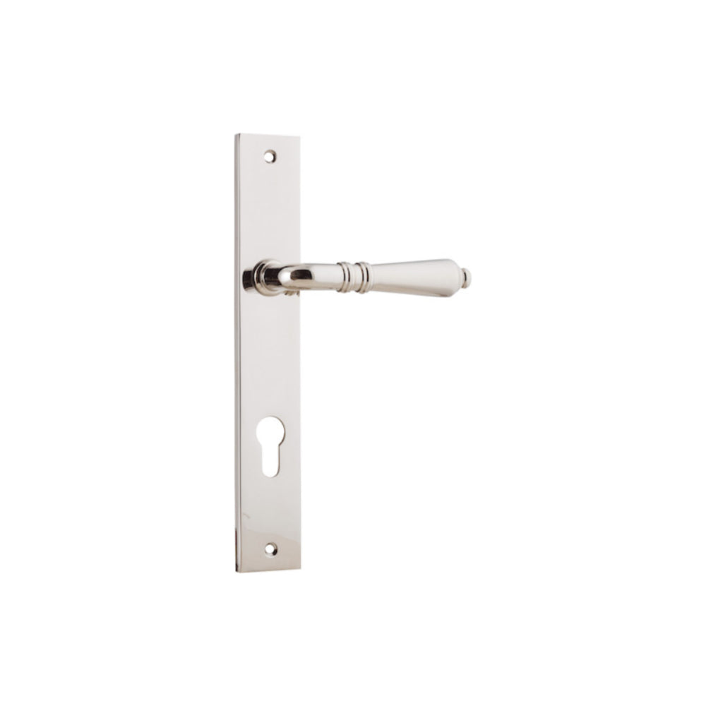 Pair of Iver Sarlat lever door handles on rectangular backplates, showcasing their elegant design and brushed metal finish.