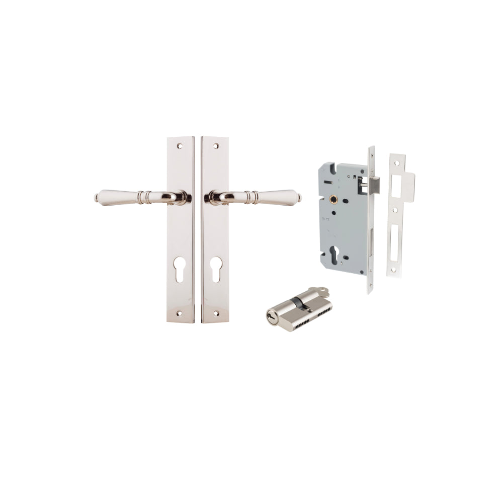 Pair of Iver Sarlat lever door handles on rectangular backplates, featuring polished brass finish and classic design.