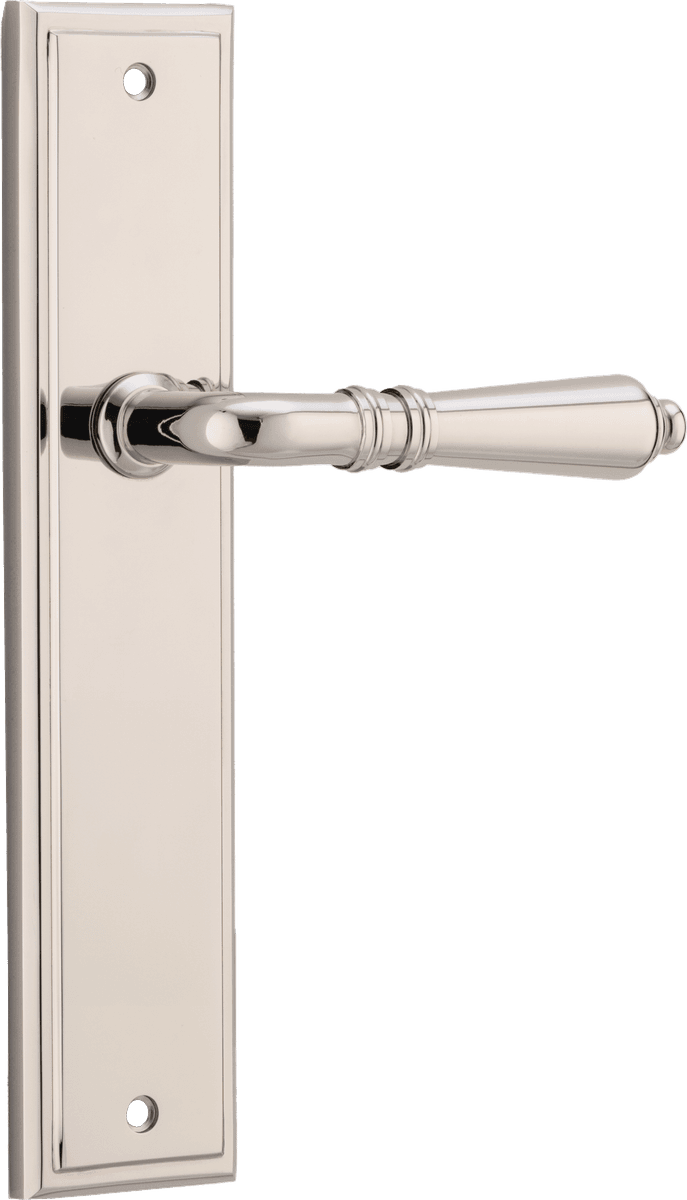 Pair of Iver Sarlat lever handles on stepped backplates, showcasing elegant, polished brass door hardware.