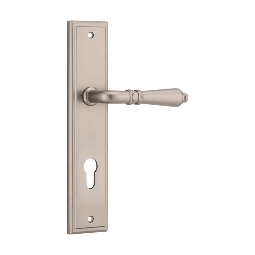Pair of Iver Sarlat lever handles on stepped backplates, featuring a classic design for interior doors.
