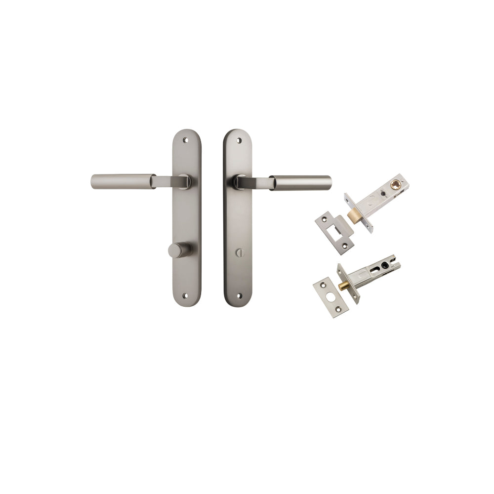 Pair of Iver Berlin lever door handles on oval backplates, featuring a sleek modern design with a polished finish.