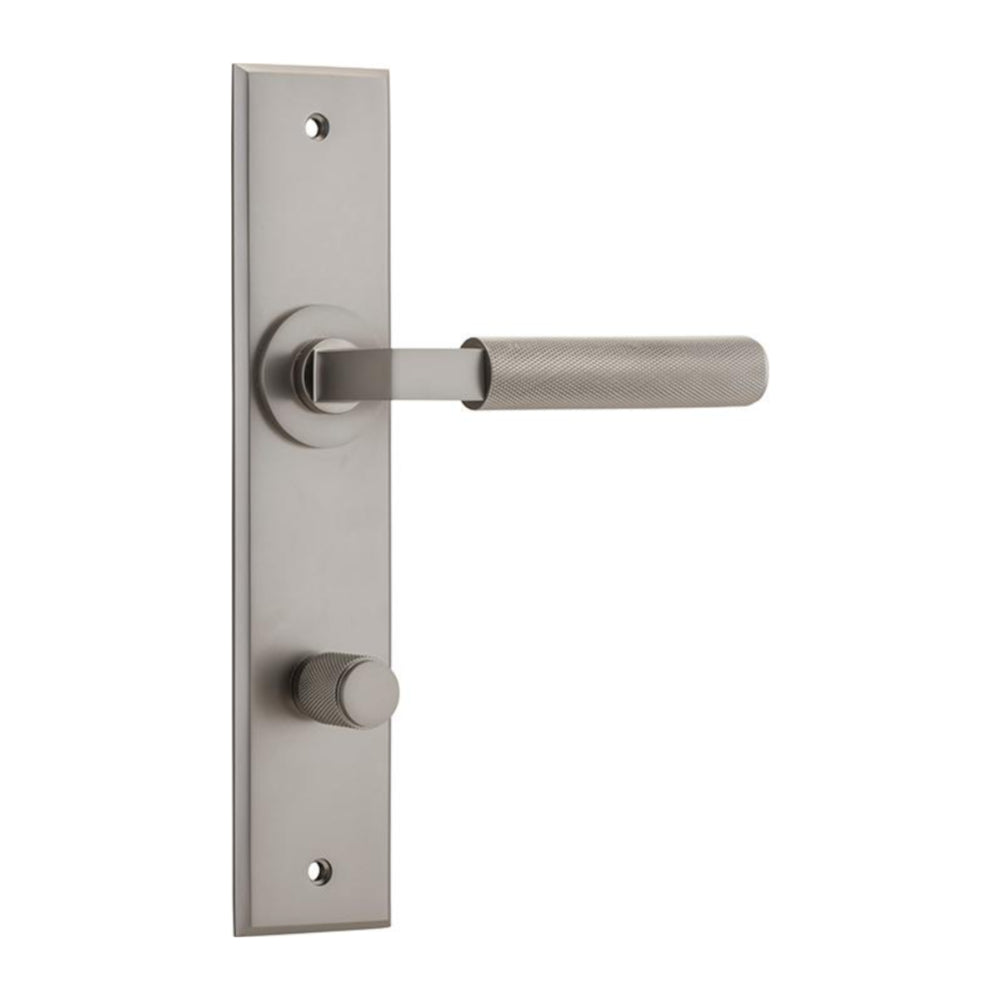 Pair of Iver Brunswick lever door handles on chamfered backplates, showcasing sleek architectural hardware design.