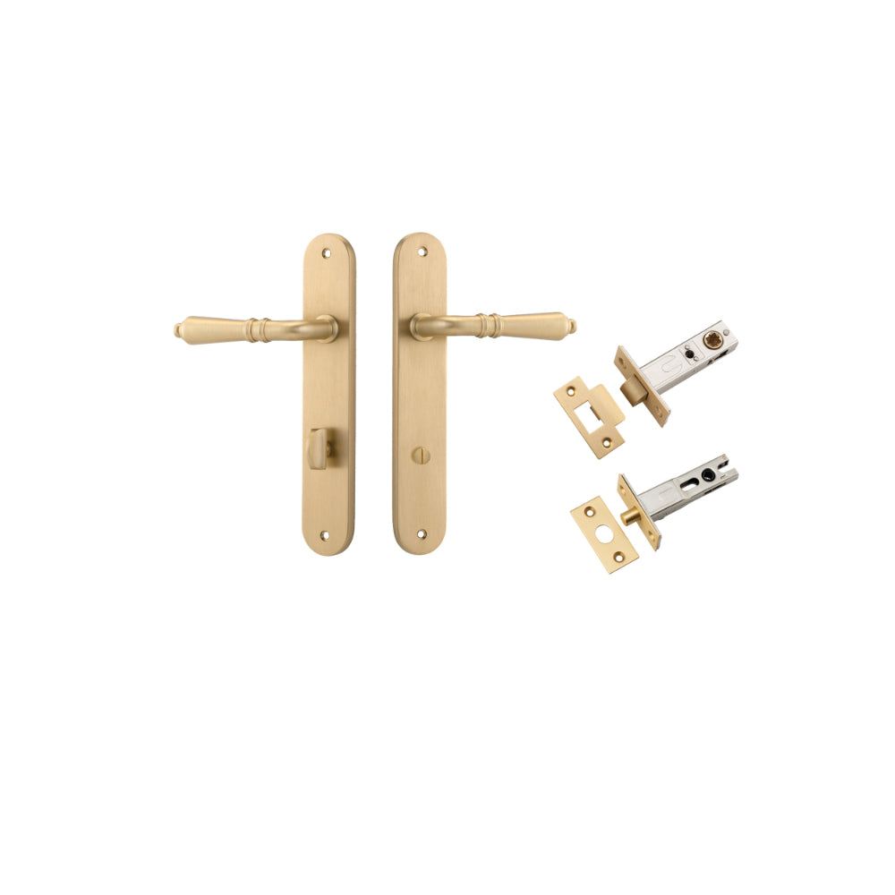Pair of Iver Sarlat lever door handles on oval backplates with a sleek brass finish, designed for stylish interior doors.