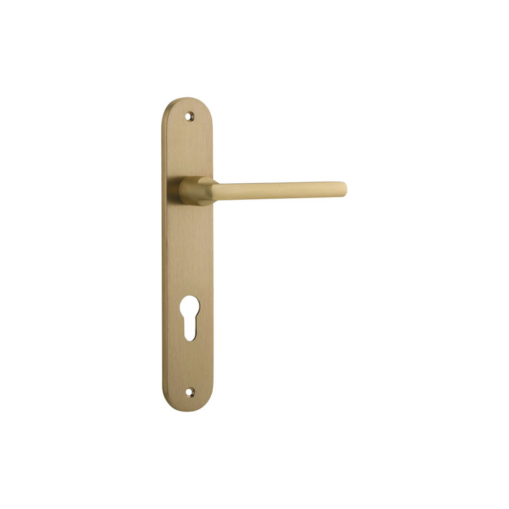 Pair of Iver Baltimore lever door handles on oval backplates, showcasing polished metal finish and elegant design.