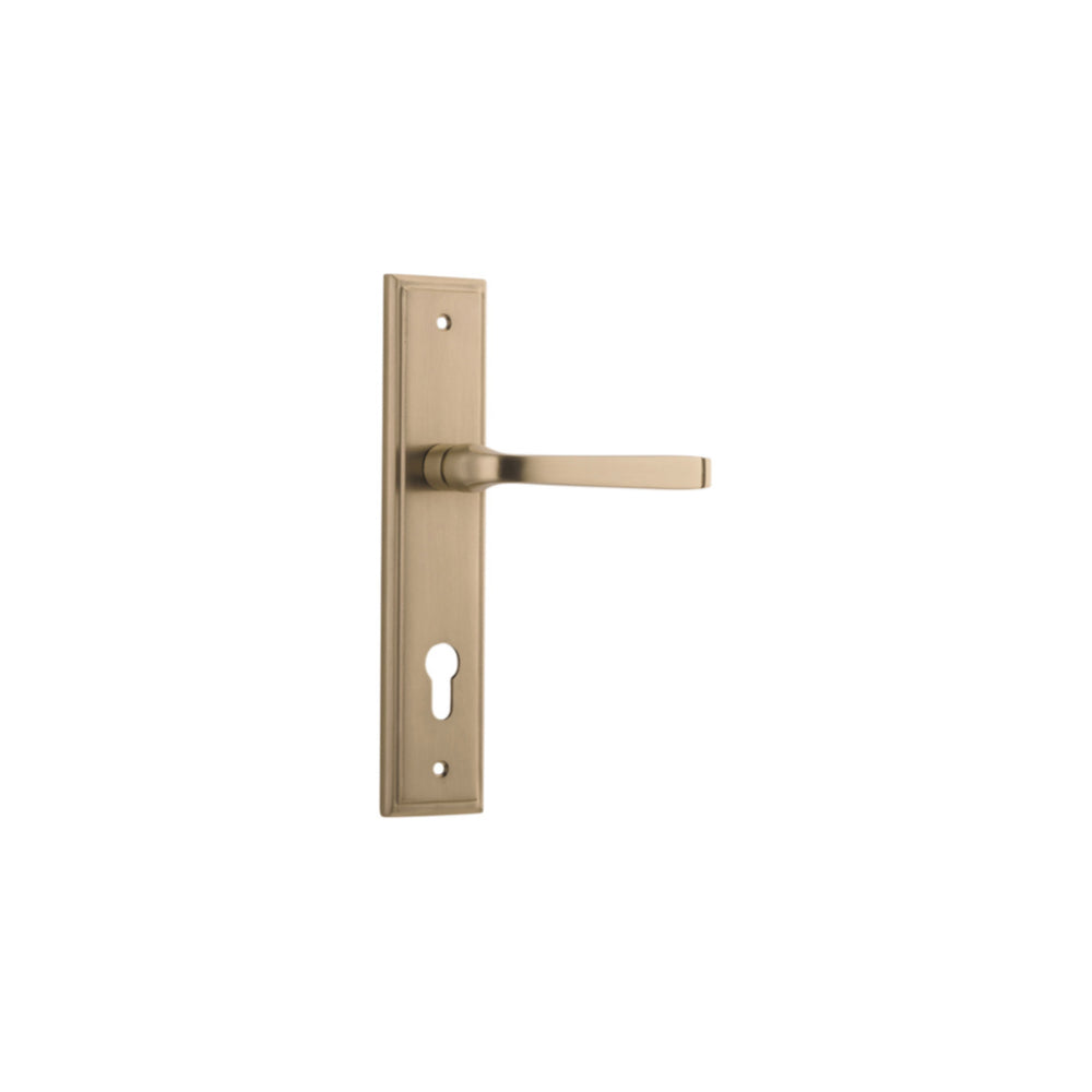 Pair of Iver Annecy lever handles on stepped backplates, featuring a sleek, modern design in polished finish.
