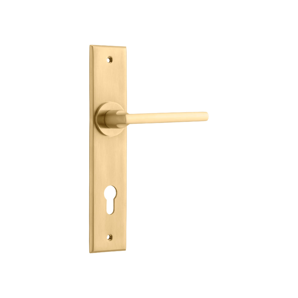 Pair of Iver Baltimore lever door handles on chamfered backplates, featuring a sleek, modern design in a brushed metal finish.