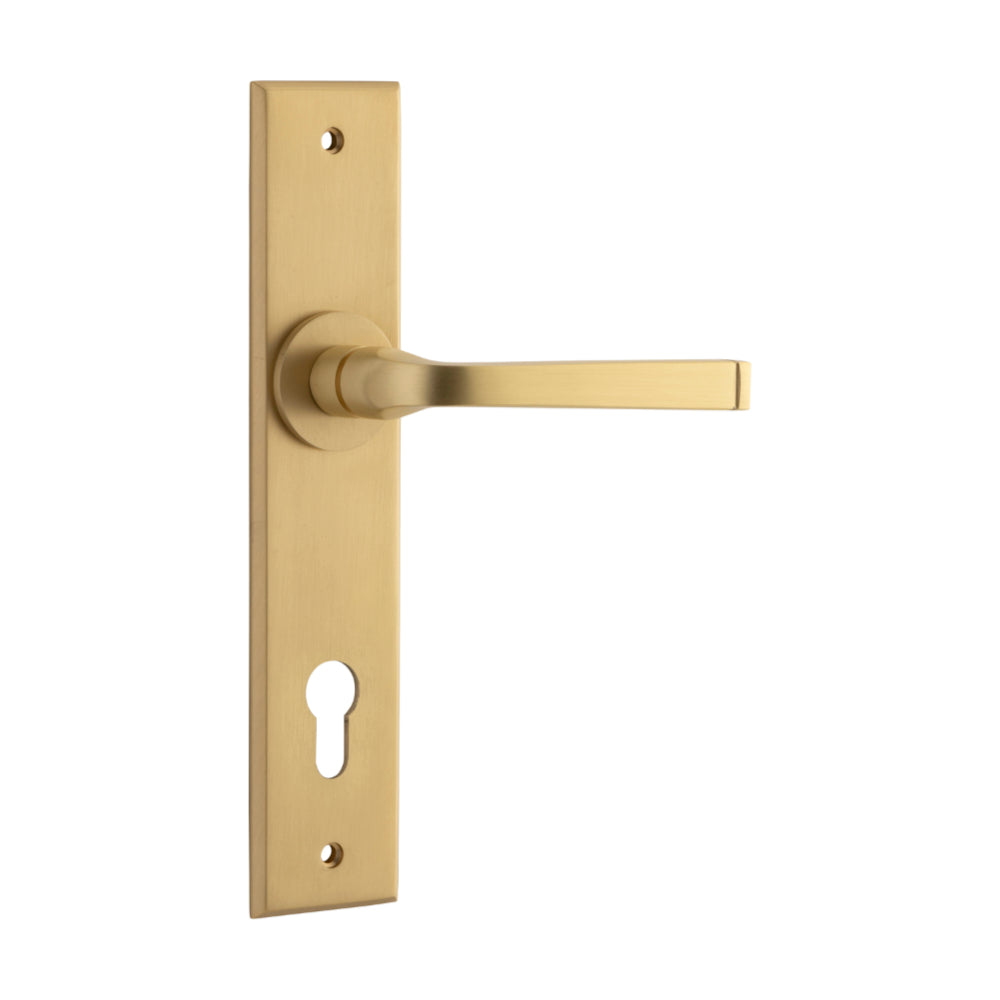 Pair of Iver Annecy lever door handles with chamfered backplates, showcasing sleek modern design and brushed metal finish.