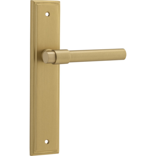 Pair of Iver Helsinki lever door handles on stepped backplates, showcasing sleek modern design in a close-up view.