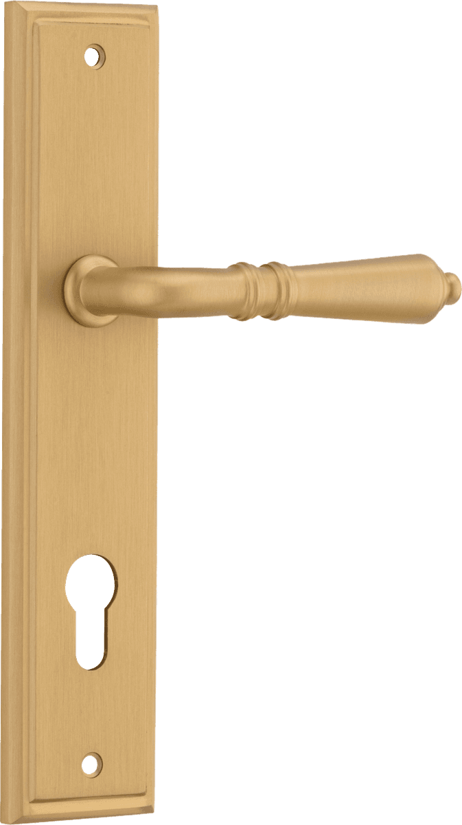 Pair of Iver Sarlat lever handles on stepped backplates with a polished brass finish, designed for classic interior doors.