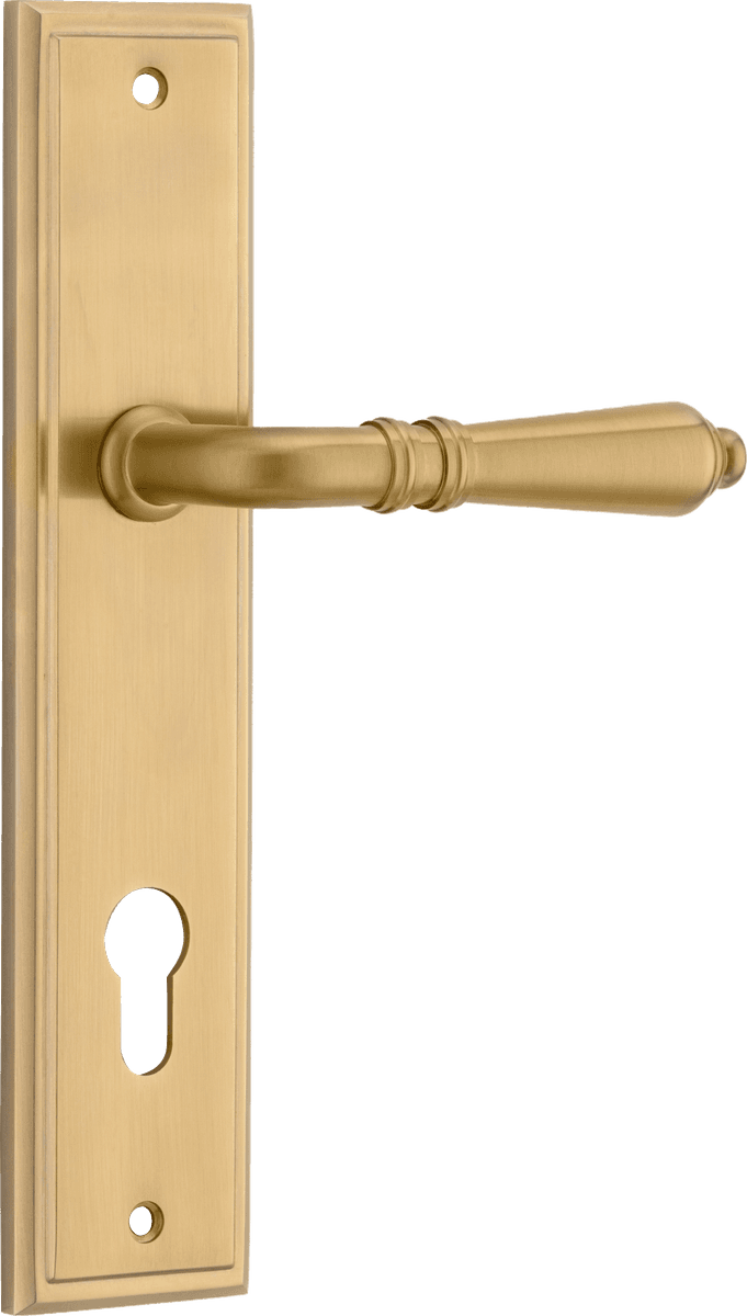 Pair of Iver Sarlat lever door handles on stepped backplate, showcasing elegant metal hardware with a polished finish.