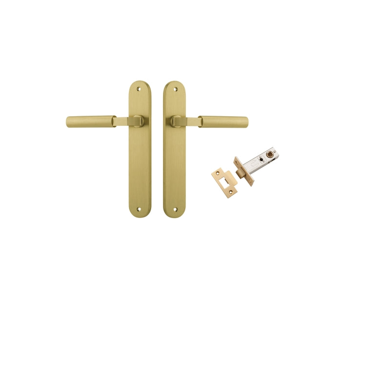 Pair of Iver Berlin lever door handles on oval backplate, polished brass finish, stylish and modern hardware for interior doors.