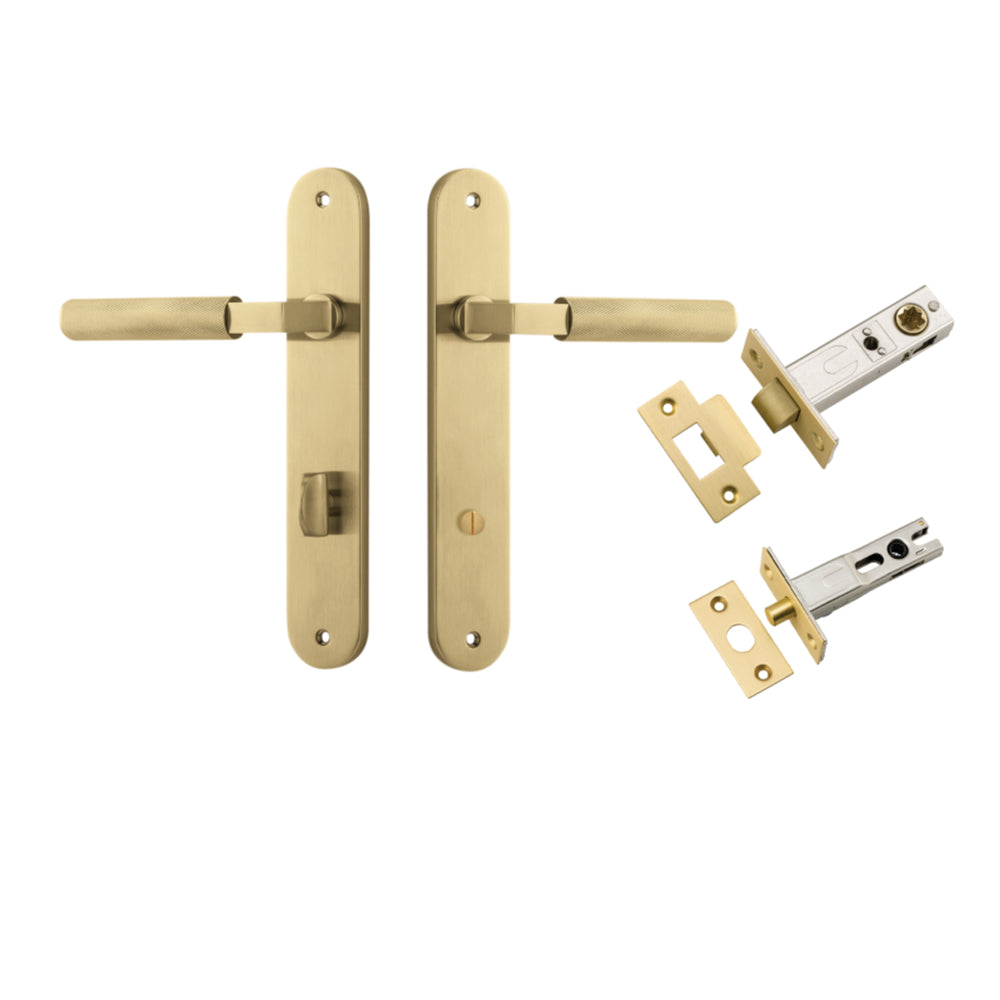 Pair of Iver Brunswick lever handles on oval backplates, architectural hardware with a sleek, modern design for doors.