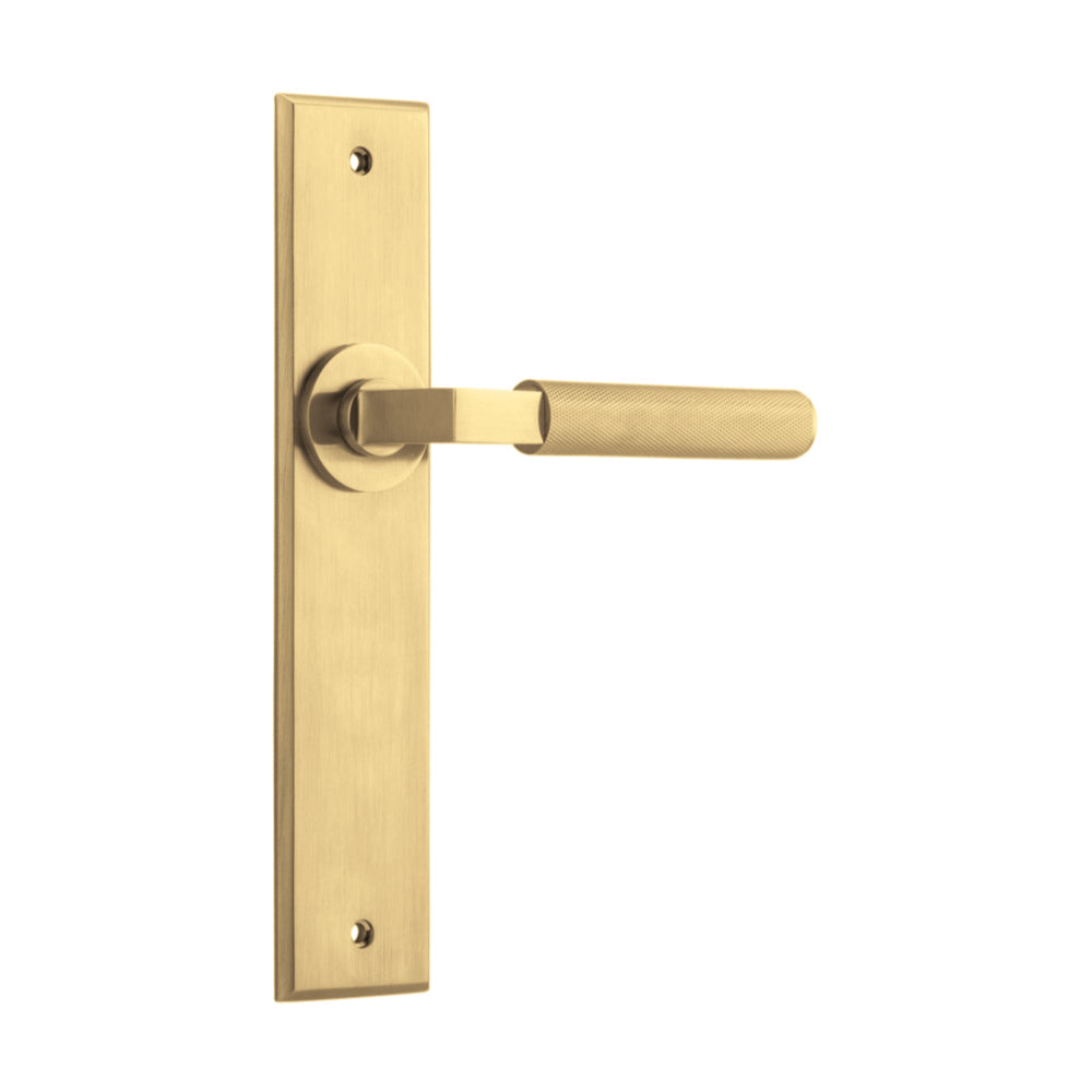 Pair of Iver Brunswick lever door handles on chamfered backplates, showcasing sleek architectural hardware design.