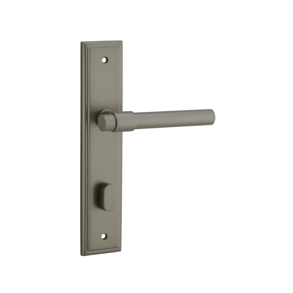 Pair of Iver Helsinki lever door handles on stepped backplates, showcasing sleek modern design and polished finish.