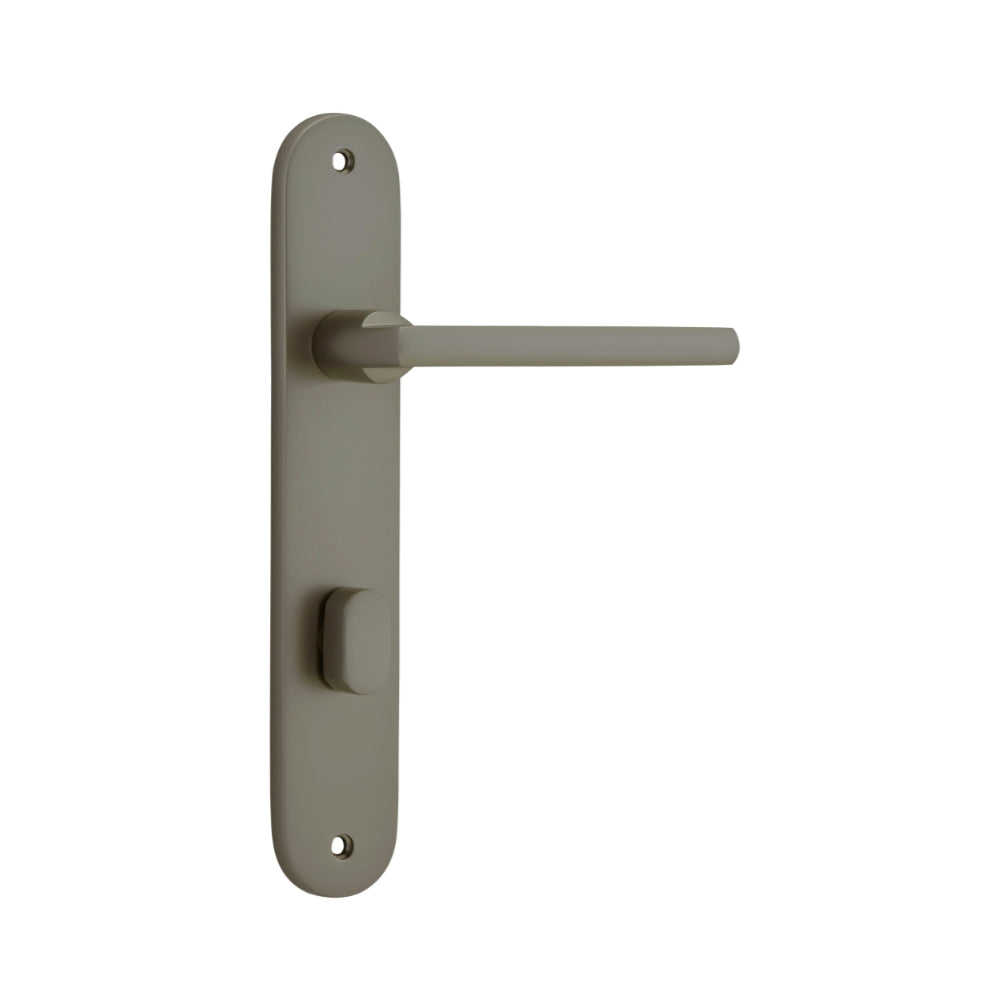 Pair of Iver Baltimore lever door handles on oval backplates, showcasing polished metal finish and elegant design.