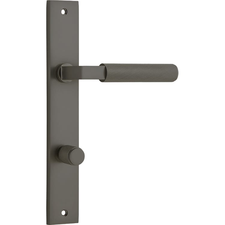 Pair of Iver Brunswick lever door handles on rectangular backplates, featuring a sleek, modern design in polished finish.