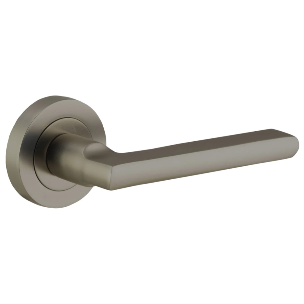 Pair of Iver Baltimore lever handles on round rose, featuring elegant design and brushed metal finish.