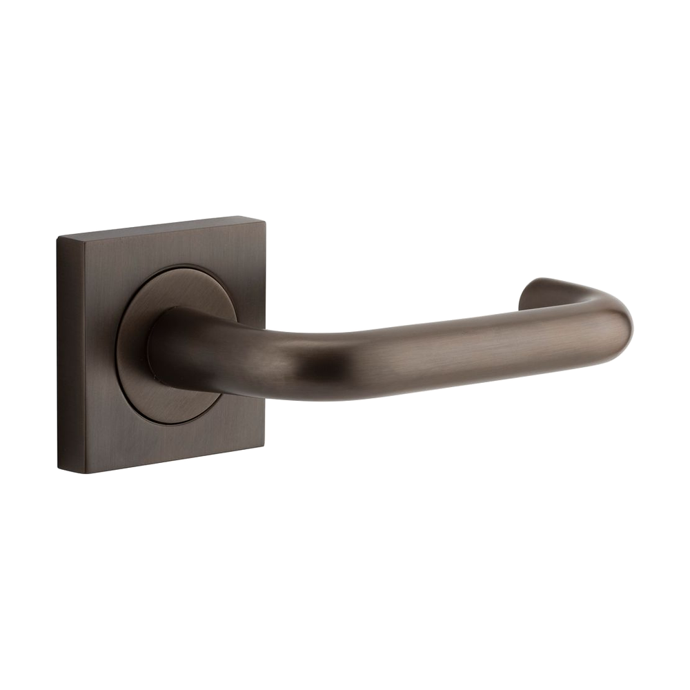Pair of Iver Oslo Lever on Square Rose architectural hardware, featuring sleek metal handles on square rose plates.