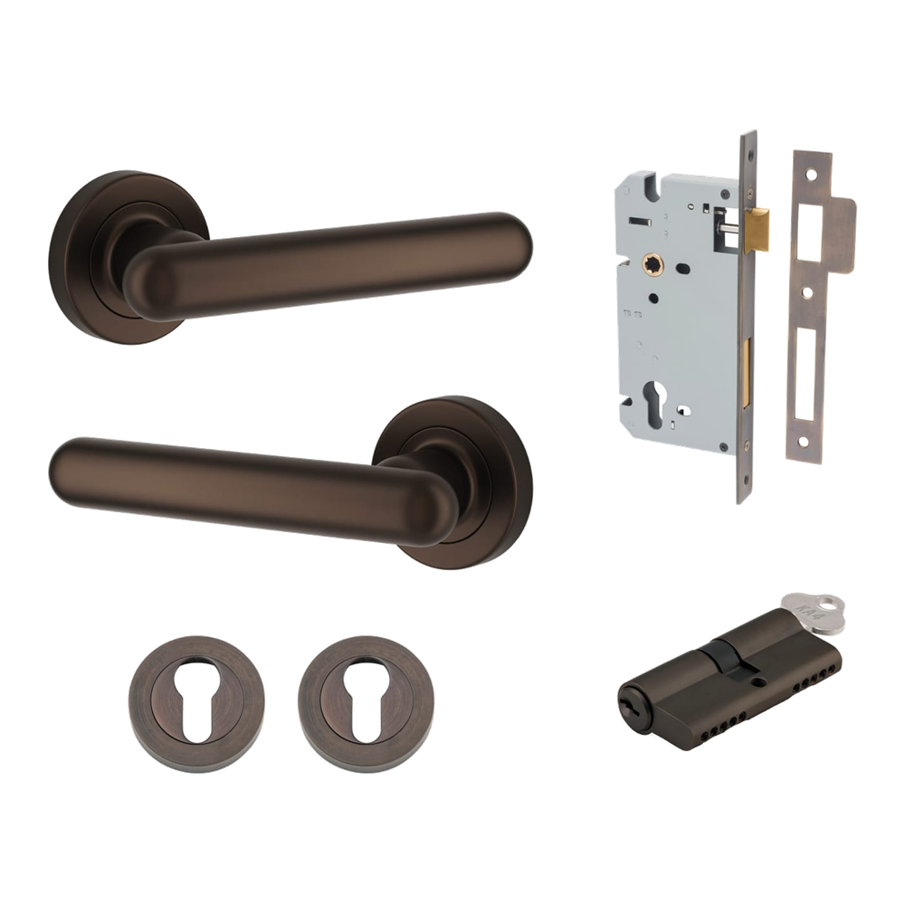 Pair of Iver Puerto Lever handles on round rose, featuring a sleek, modern design in a polished finish.
