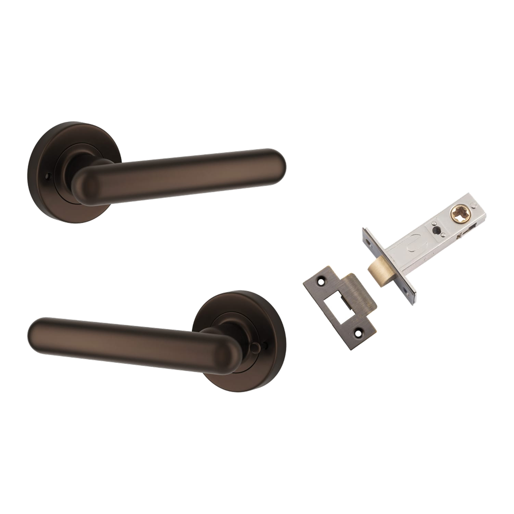 Pair of Iver Puerto lever handles on round rose, featuring a sleek, modern design in a polished finish.