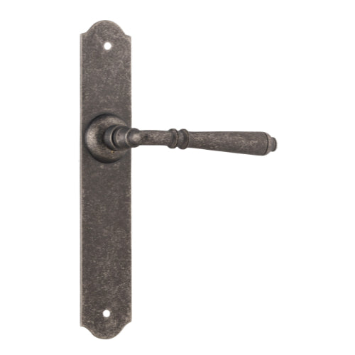 Pair of Tradco Reims lever handles on long backplates, featuring a sleek, modern design for interior door hardware.