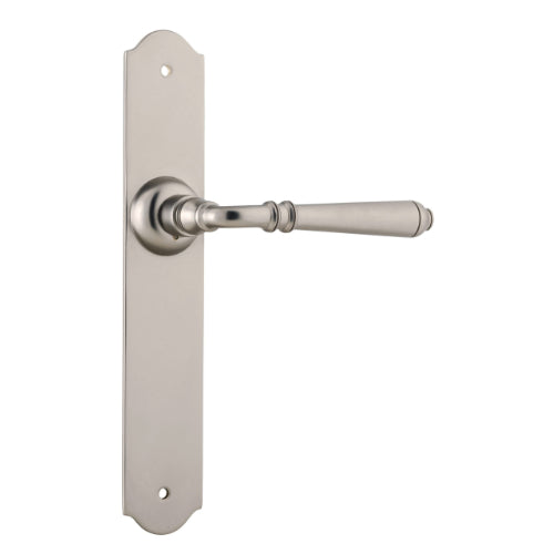 Pair of Tradco Reims lever door handles on long backplates, featuring a sleek, modern design for interior doors.