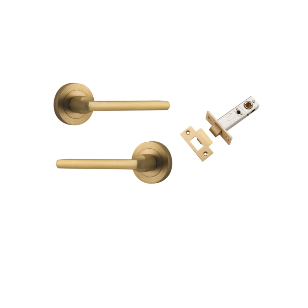 Pair of Iver Baltimore lever door handles on round rose, featuring sleek design and polished finish for modern interior doors.