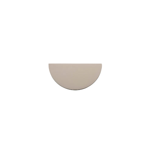 Iver Osaka half moon lip cabinet pull, architectural hardware in brushed metal finish, mounted on a cabinet door.