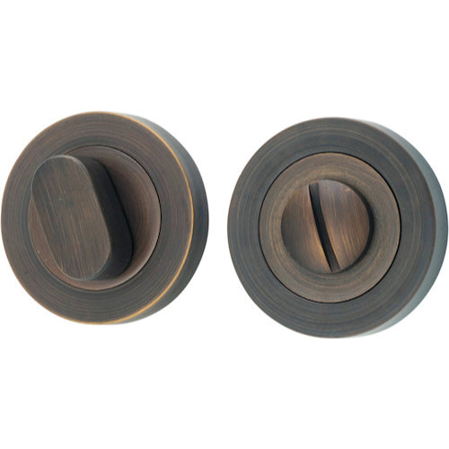 Iver Privacy Set - Round, architectural hardware with round design, featuring a sleek, modern finish for bathroom or bedroom privacy.
