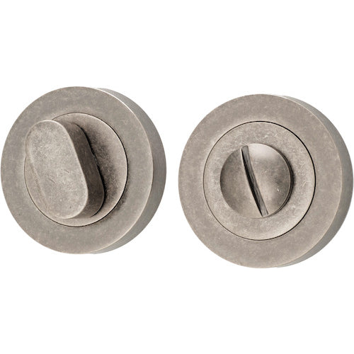 Iver Privacy Set in round design, architectural hardware with privacy lock and latch for bathroom or bedroom doors.