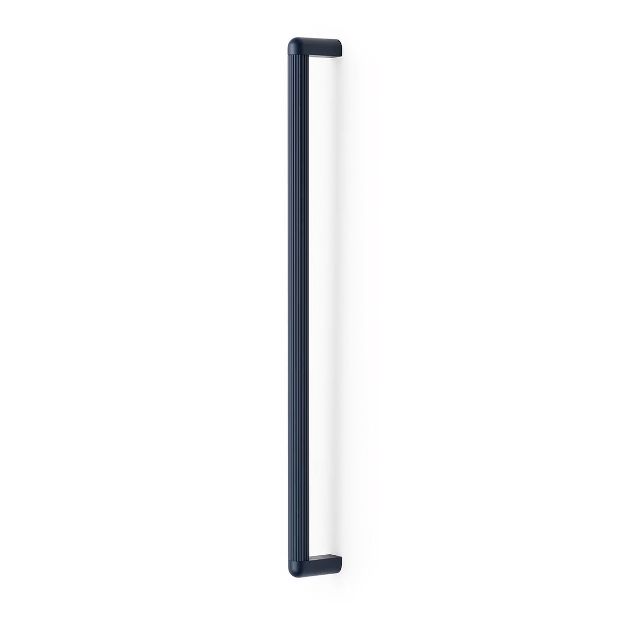 Momo RISS large cabinet pull handle in black finish, mounted on a wooden cabinet door, showcasing modern hardware design.