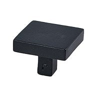 Jolie Carre40 black door knob with 40x40x30mm square design, shown on a door in a close-up image.