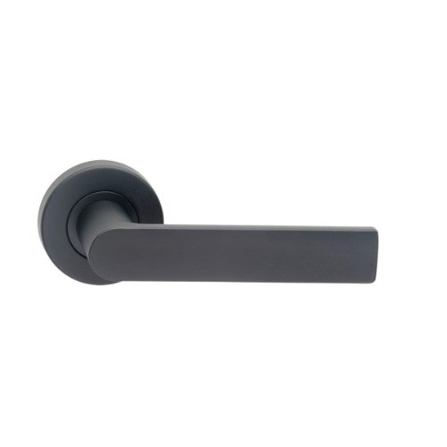 Black Madinoz Lever 014 door handle by DormaKaba, showing the sleek lever design and matte finish.