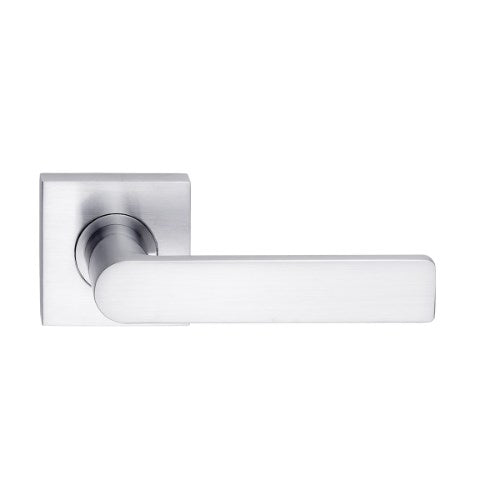 Close-up of Madinoz Lever 014 door handle by DormaKaba, showing its sleek design and polished finish.