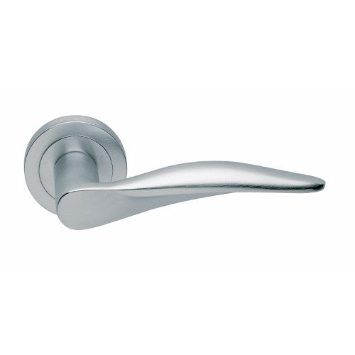 Manital DALI door handles shown on a door, featuring sleek, modern design with polished metal finish.