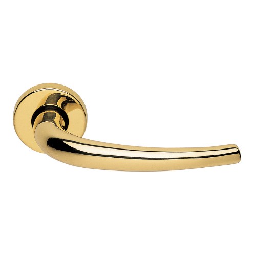 Manital LILLA door handle in polished brass, modern design with sleek, ergonomic grip mounted on a door.