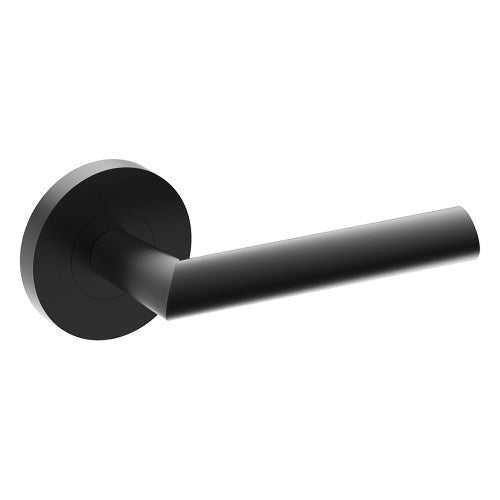 Black COMO door handle by Style Finish Doorware mounted on a door with a sleek, modern design.