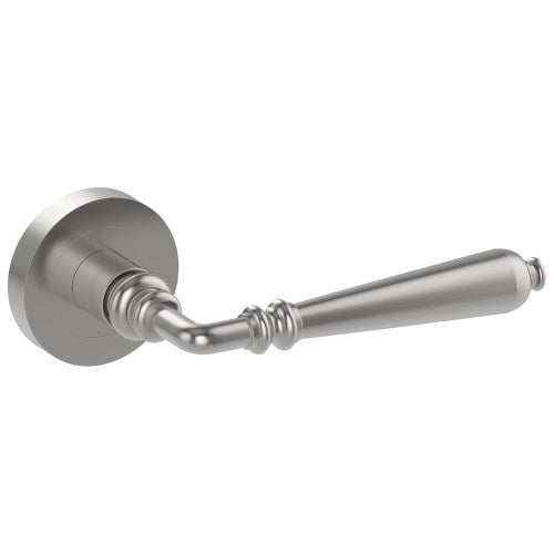 Stainless steel Elegante door handle by Style Finish Doorware mounted on a modern door.