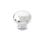 Momo LUGO cabinet knob in a sleek finish, mounted on a wooden cabinet door, showcasing modern hardware design.