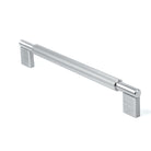Momo ARPA D cabinet pull handle in brushed dark bronze finish, showcasing sleek modern design on a wooden cabinet.