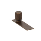 Momo ARPA cabinet knob with backplate, featuring a sleek, modern design in a polished finish, mounted on a cabinet door.
