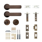 Momo Aspen lever handle in bronze finish with sleek design, mounted on a door for easy opening and closing.