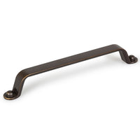 Momo BUTTON cabinet pull handle in brushed antique bronze finish, showing a close-up of the round, button-style hardware on a cabinet door.