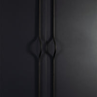 Momo BRAVE Bow Cabinet Pull Handles in black finish mounted on a cabinet door, showcasing sleek, curved design for kitchen or furniture.
