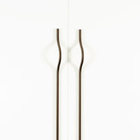 Momo BRAVE Bow off-centred cabinet pull handle in matte titanium finish, featuring a sleek curved design for modern cabinets.